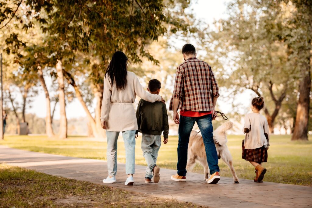 Multigenerational family together on a walk representing trust and estate planning in Sonoma County.