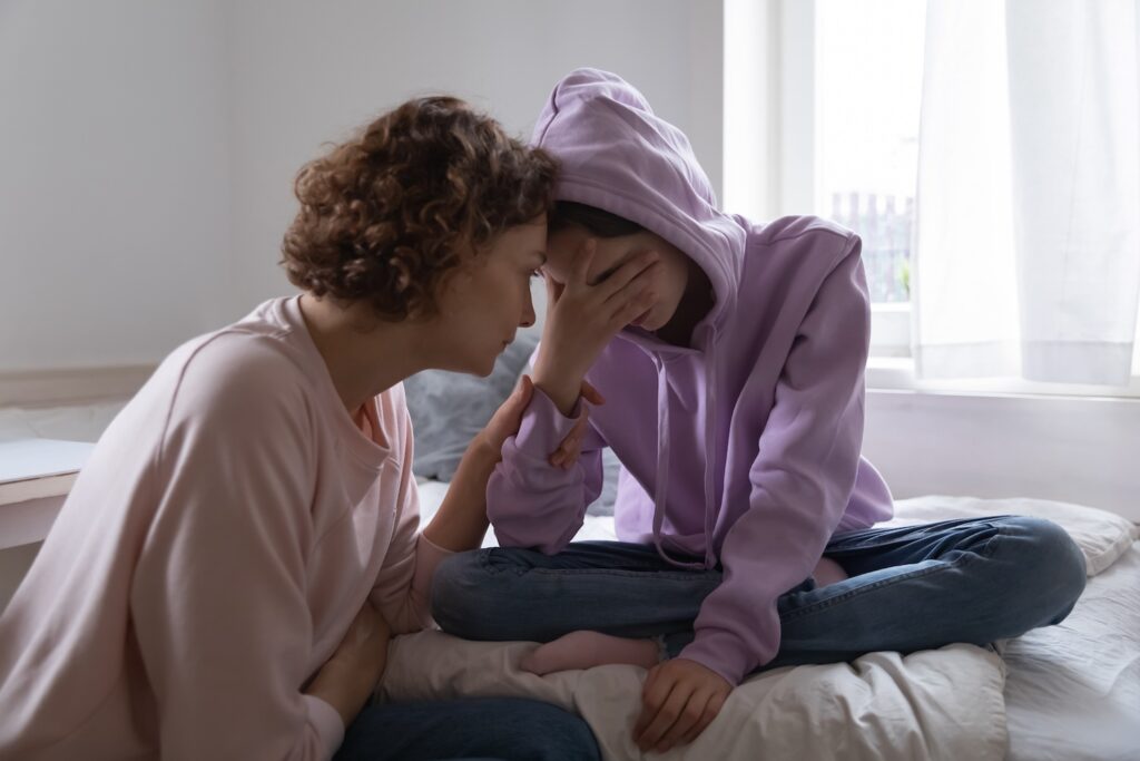 Parent supporting teenager facing juvenile court in California.